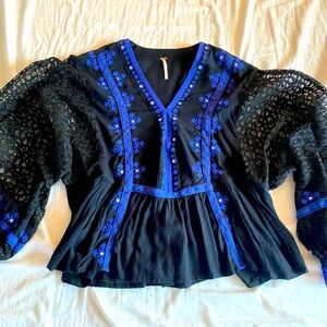 Black and blue Free People blouse. Size M. No flaws.